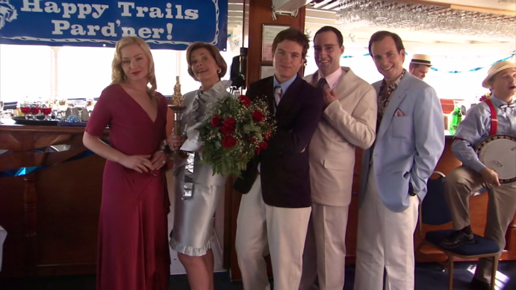 Michael Bluth stands with his sister Lindsay, mother Lucille, brother GOB and brother Buster