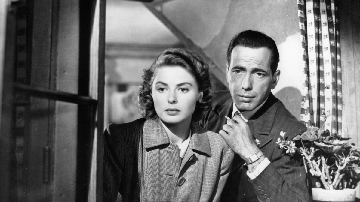Rick Blaine and Ilsa Lund from Casablanca looking out the window.