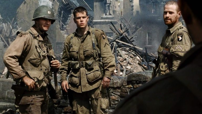 Tom Hanks and Matt Damon as WWII soliders standing in the rubble of a building in Normandy in  Saving Private Ryan 