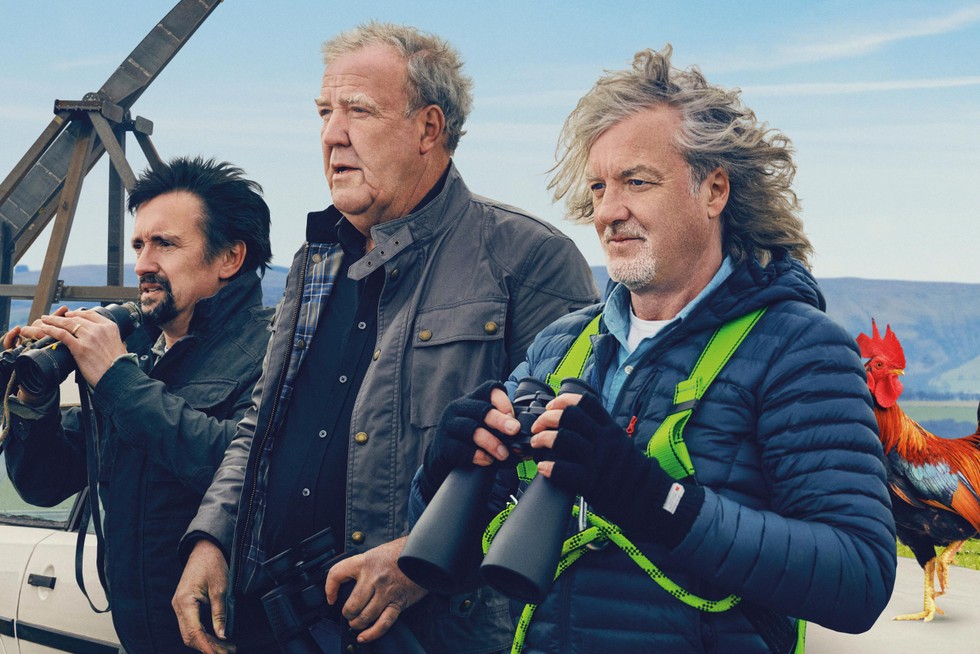 An image of Richard Hammond, Jeremey Clarkson and James May staring out to sea for The Grand Tour