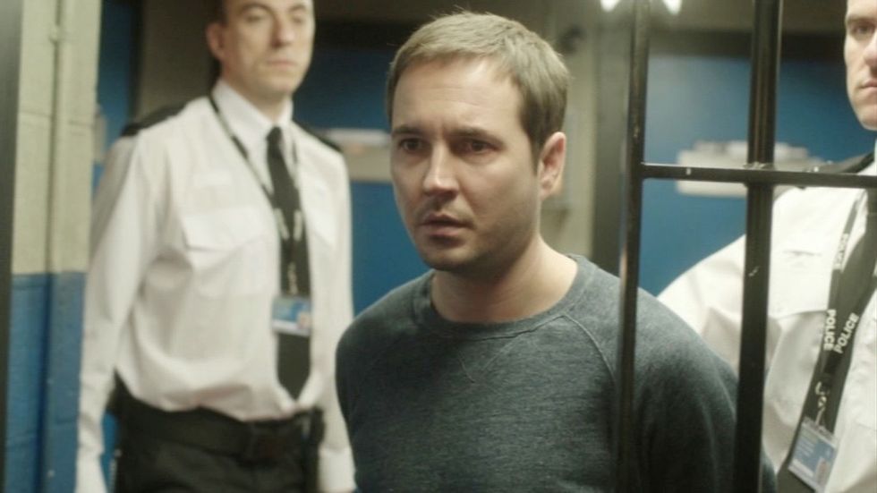 DS Steve Arnott in Line of Duty s03e06 wearing plain clothes and being sent into a police cell