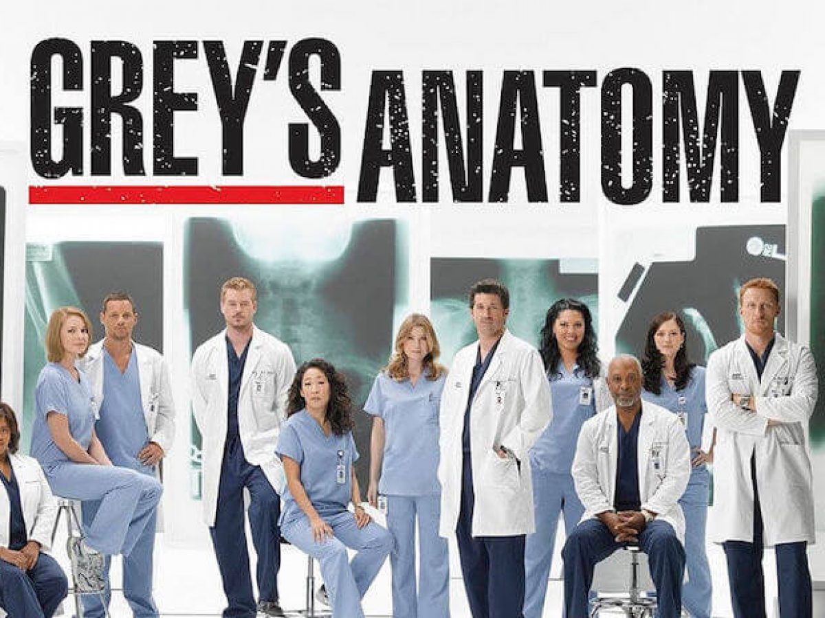Grey'a Anatomy movie poster depicting most of the cast in scrubs with x rays behind them.