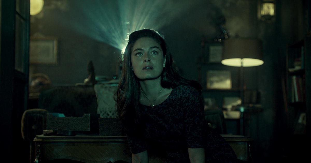 Julianna Crane, the protagonist in The Man in the High Castle, watches a film ominoususly.